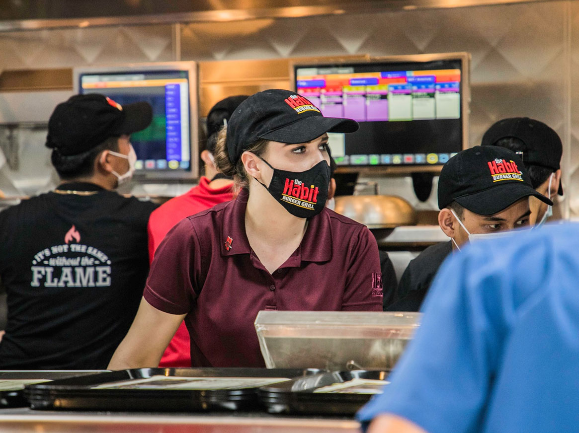 Team members behind the counter