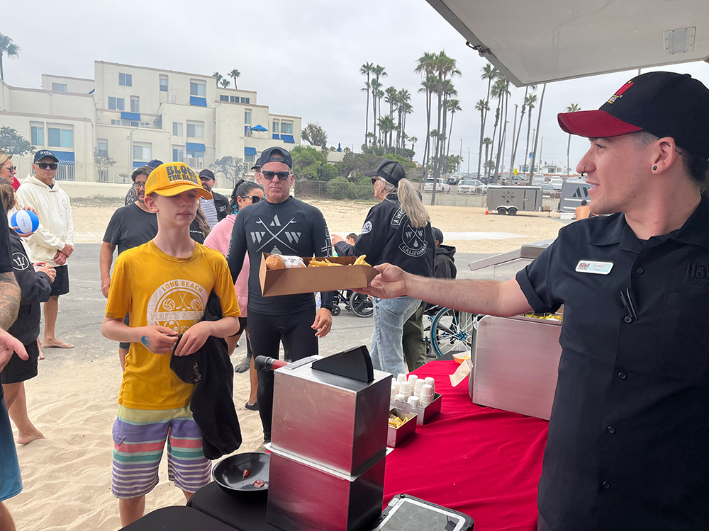 Serving Habit Burger and Grill meals to A Walk on Water participants