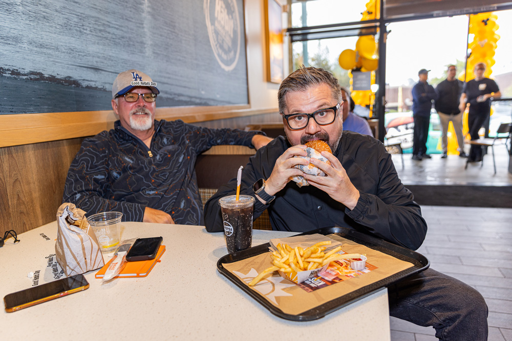 Two guys enjoying a meal at Good Habits Day
