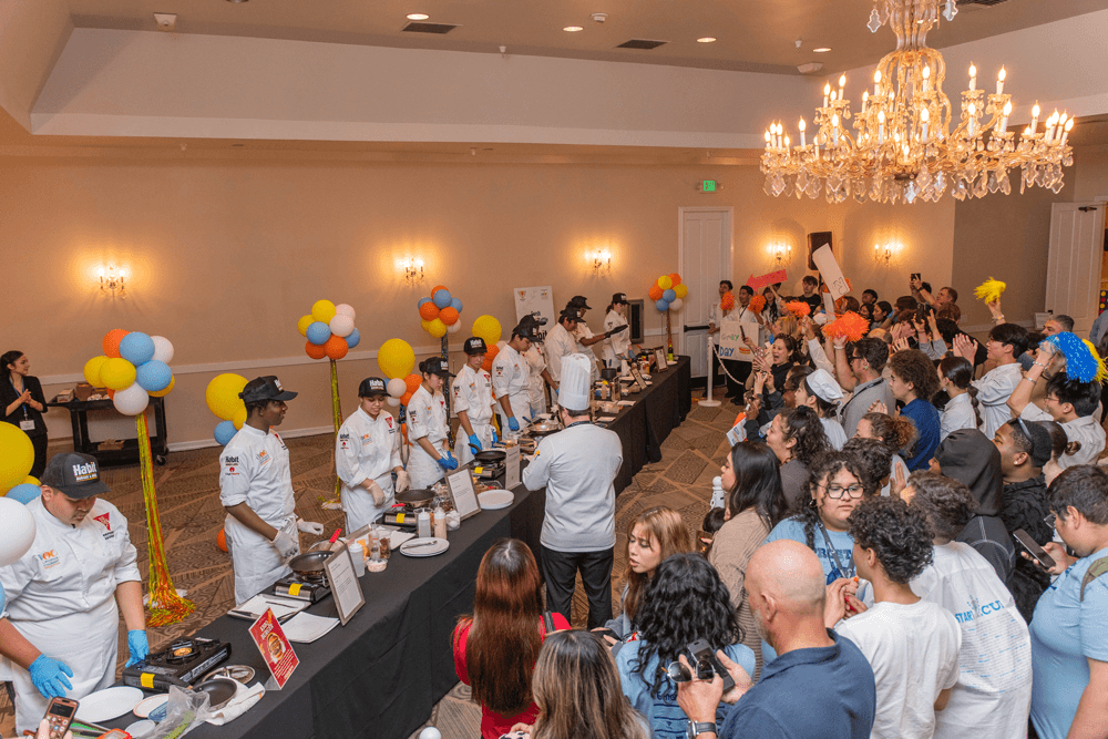ProStart participants at a long table