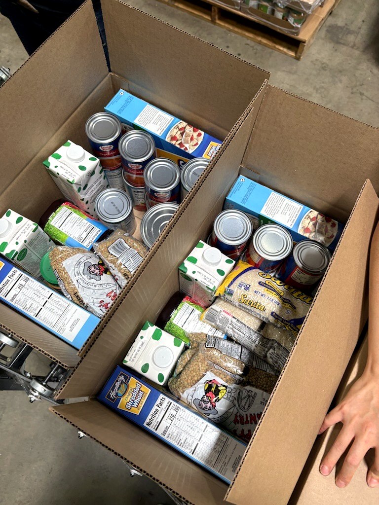 Habit Team Boxes Donations for Distribution at the OC Food Bank